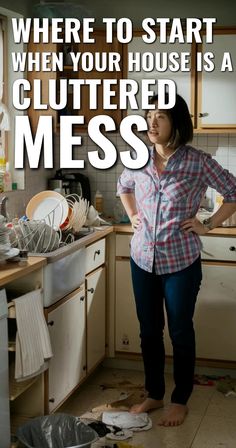 a woman is standing in the kitchen with her hands on her hips and looking at the floor