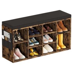 a wooden shoe rack filled with pairs of shoes