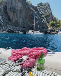 there is a pink blanket on the boat