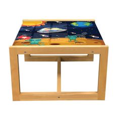 a small wooden table with an outer space theme on the top and bottom surface, in front of a white background