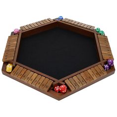 a wooden board game set with dices and dominos on the sides, all in different colors