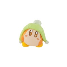 a close up of a small toy with a green hat on it's head