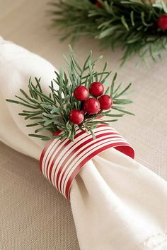 napkins with holly and red berries on them