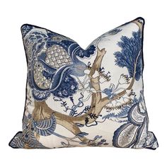 a blue and white pillow with an animal design on it