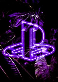 the playstation logo is lit up with neon purple lights in front of some plants and palm trees