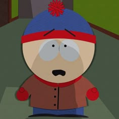 a paper cut out of south park's bob from south park is wearing a red and blue hat