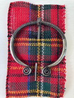 Use this the Celtic brooch as a cape clip or sweater clip, suitable for most knitted or crocheted open knit garments. The shawl pin can also be clipped to a variety of clothing, such as your scarf, cloak, shawl, cardigan, sweater, cape and more. Vintage and Delicate: This shawl pin features classic Celtic elements adding appeal and beauty to everyday wear The pin is easy to operate and is made of quality alloy material, sturdy and serviceable, not easy to deform or break. Scottish Shawl, Celtic Elements, Celtic Brooch, Cloak Pin, Knit Garments, Sweater Cape, Sweater Clips, Sweater Clip, Shawl Pin