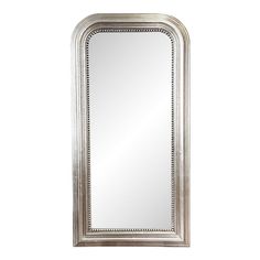 a silver framed mirror on a white wall