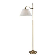 a floor lamp with a white shade on the base and a gold metal pole,