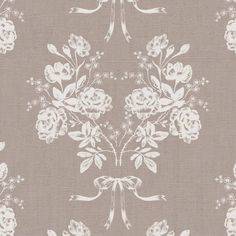 an old fashioned wallpaper with white flowers and bows on grey background, as well as the