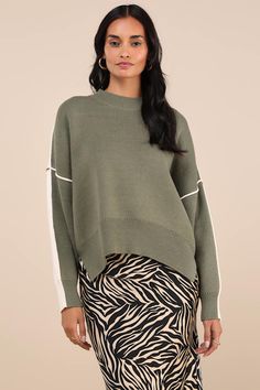 For a two-in-one look that's sure to get compliments, we love the Lulus Seasonally Stylish Green and Ivory Color Block Pullover Sweater! Medium-gauge sweater knit shapes this perfectly cuddly sweater that has long sleeves with drop shoulders and a color block design with a green-toned front and an ivory back. Contrasting seams accent each side, and a relaxed bodice with notched hems completes the look. Ribbed knit at the neckline, cuffs, and hem. Fit: This garment fits true to size. Length: Size medium measures 21.75" from shoulder to hem. Bust: Great for any cup size. Waist: Not Fitted - comfortable room throughout midsection. Undergarments: May be worn with any standard bra. Fabric: Fabric is very stretchy. Unlined. 54% Cotton, 36% Acrylic, 10% Polyester. Hand Wash Cold. Do Not Bleach. L Green Crew Neck Sweater With Contrast Color, Casual Green Color Block Sweatshirt, Green Contrast Color Crew Neck Sweatshirt, Green Long Sleeve Color Block Cardigan, Green Color Block Knit Sweater, Color Block Sweater, Ivory Color, First Look, Sweater Sizes