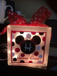 a light up box with a minnie mouse on it's side and the name hannah grace