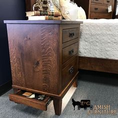 a wooden dresser sitting on top of a carpeted floor