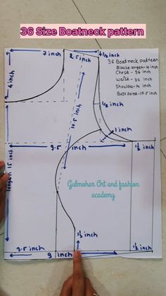 a person pointing at a diagram on a piece of paper that says, 3 / 8 stas rohtneck pattern