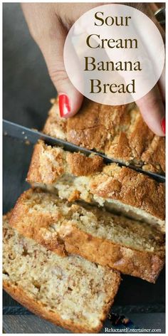 a person holding a loaf of banana bread with the words sour cream banana bread on it