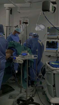 medical personnel performing surgery in an operating room