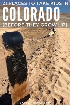 a snowboard sitting in the sand with text overlay reading 21 places to take kids in colorado before they grow up