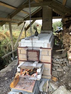 an outdoor oven is being used as a fire pit for cooking food and other things