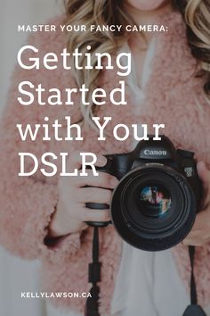 a woman holding a camera with text overlay that reads, master your fancy camera getting started with your dslr