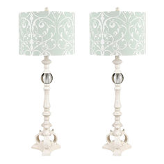 a pair of white table lamps with blue shades