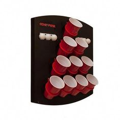 a black and red wall mounted cup rack with cups on it's side,