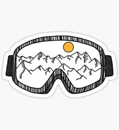 a pair of ski goggles with mountains in the background sticker on a white surface