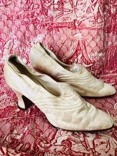 A beautiful pair of art deco ivory silk wedding shoes in a UK size 4. In good vintage wearable condition with wear to the silk in places. Heel height 3.5"/9cm Leather heels and soles in good condition with 4 imprinted into the sole. Lined in soft kid leather. A pointed tongue to the front with stitching to add detail. A pointed toe. So pretty to wear, collect, display. Vintage Weddings, Ivory Silk, Womens Wedding Shoes, Silk Wedding, Shoes Uk, Wedding Shoes, Leather Heels, Wedding Shoe, Heel Height