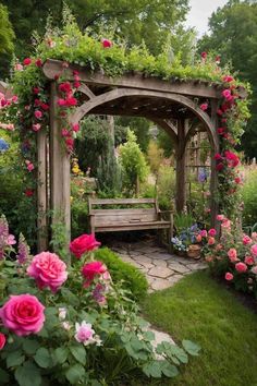 a wooden bench sitting in the middle of a garden filled with pink flowers and greenery