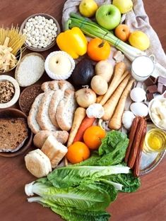 a table topped with lots of different types of food