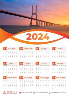 a calendar with the image of a bridge in the background and an orange ribbon around it