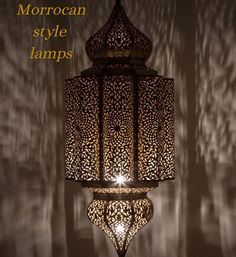 a lamp that is lit up with the words moroccan style lamps above it and below it