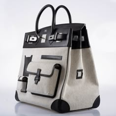 Hermès Cargo HAC Birkin 40 Black Box & Toile with Palladium Hardware – JaneFinds Cargo Birkin, Hac Birkin, French Ethereal, Birkin 40, Spring Accessories, Iconic Design, Hermes Bags, Black Box, Runway Show