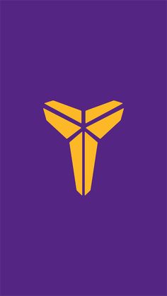 the letter t is made up of two pieces of paper in yellow on a purple background