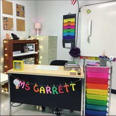 a desk with a sign that says mrs garrett on it