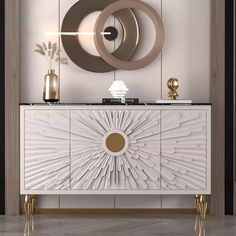 a white and gold cabinet with two circular mirrors on it's wall above it