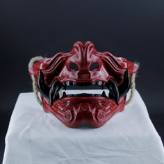 Oni samurai Masks Ghost of Tsushima Mask We Can Keep for Art and Collection Turkish made handmade masks. We are happy to produce our masks that we have carefully prepared for you, our valued customers, as we go from daily life to fun moments. The masks we produce are comfortable to use. We painted our coloring processes in colors that we think are suitable for parties, proms, festivals and entertainment areas. If you wish, you can choose the colorless (raw) form and paint it according to your ow Red Oni Mask, Oni Maske, Mascara Oni, Japanese Oni Mask, Fencing Mask, Oni Samurai, Ronin Samurai, Samurai Mask, Black Teeth