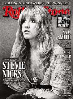 the cover of rolling stone magazine with a woman sitting on her lap and looking off to the side