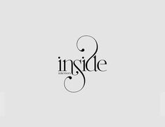 the inside magazine logo is shown in black on a gray background with an elegant swirl design