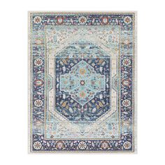 a blue and white rug with an ornate design