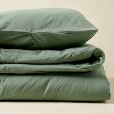 three pillows stacked on top of each other