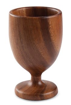 a wooden cup on a white background