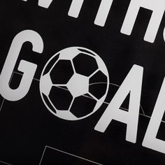 a black and white sign with a soccer ball on it's side that says nothing goal