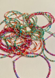 These handmade seed bead bracelets are the perfect choice to add a pop of color to your day! Each bracelet was made intentionally unique to stand out. The colorful glass beads are gorgeously glossy paired with their golden friends. Bead Bracelets, Seed Bead Bracelets, Seed Bead, Colored Glass, Favorite Jewelry, Seed Beads, Glass Beads, Color Pop, Jewelry Bracelets