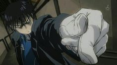 an anime character with black hair and white hands on his chest, pointing at the camera