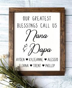 a framed sign with the words our greatest blessing call us, dana and papaa