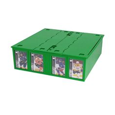 a green plastic box with four compartments for hockey cards on the front and back sides