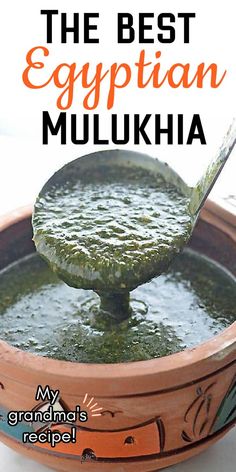 the best egyptian mulkia recipe is in a bowl with a spoon full of green liquid