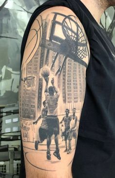 a man with a basketball tattoo on his arm