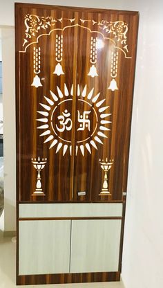 the door is decorated with white and brown designs