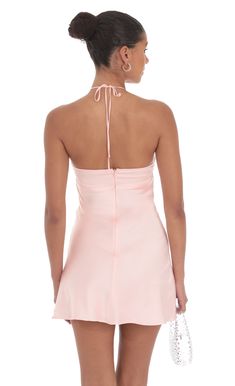 Designed in Los Angeles- Mini Length- Zipper and back tie closure- Fully lined- Sheer- Made in satin fabric- Hand wash coldModel is wearing a size small that measures 31in/79cm in lengthSlight modifications might be made to improve garment quality.Handling the garments with care, hand-washing and air-drying is strongly recommended. Hoco Inspo, Satin Halter Dress, Pink Dress Short, Women Sleepwear, Floral Halter Dress, Loungewear Jumpsuit, Silk Mini Dress, Hoco Dresses, Pink Mini Dresses